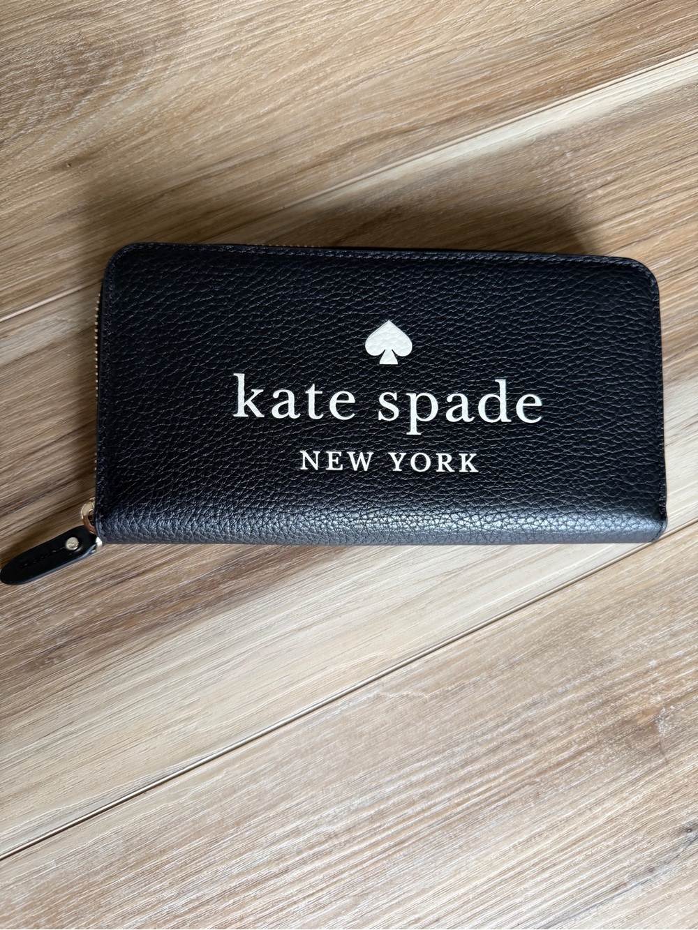 Kate Spade New York continental wallet black pebbled leather embossed white logo